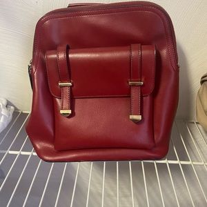 Red “leather” backpack